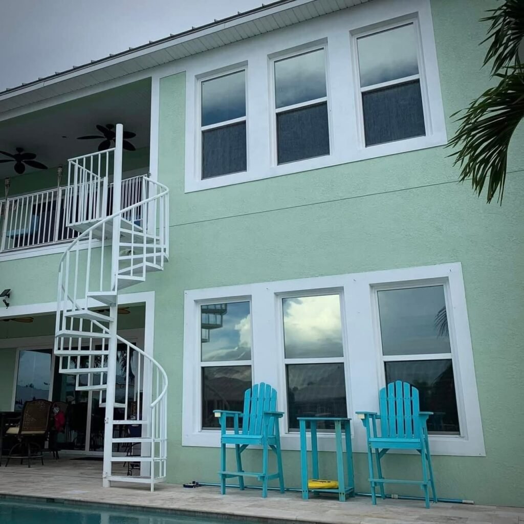 Two-story home with residential window tint installed by K&H Window Tinting near Riverview, FL